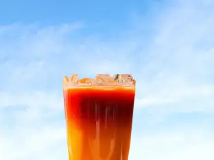 delicious First Watch Blazing Dragon juice with a flavorful combination of spicy ingredients and vibrant colors.